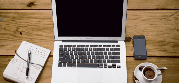 Mac Book Air and a cup of Coffee Mac Book Air and a cup of Coffee